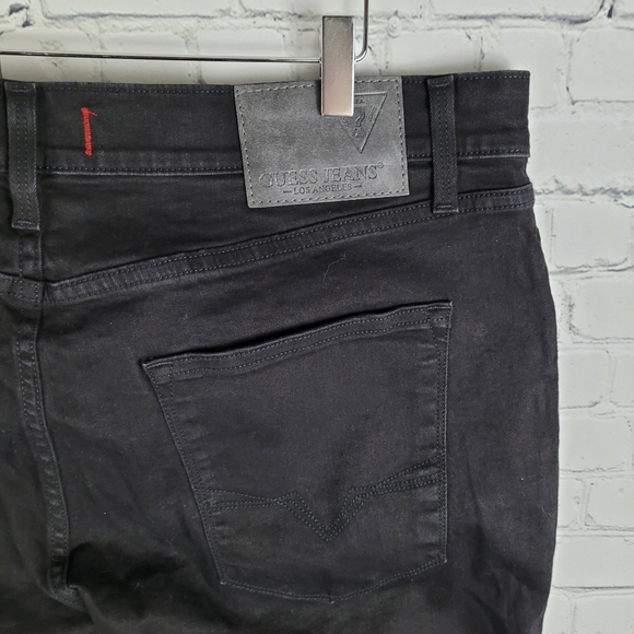 GUESS | Vermont slim fit low rise tapered leg jeans - Picture 1 of 9